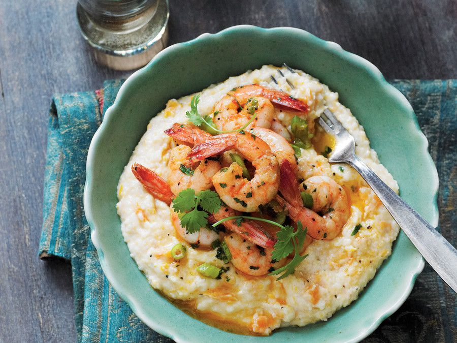 A bowl of creamy grits topped with sauteed shrimp, a dish made with Jimmy Red grits